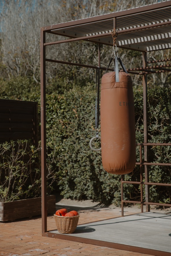 A boxing bag on a sunlit Italian patio